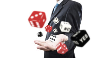 Businessman rolling dice. Investments concept