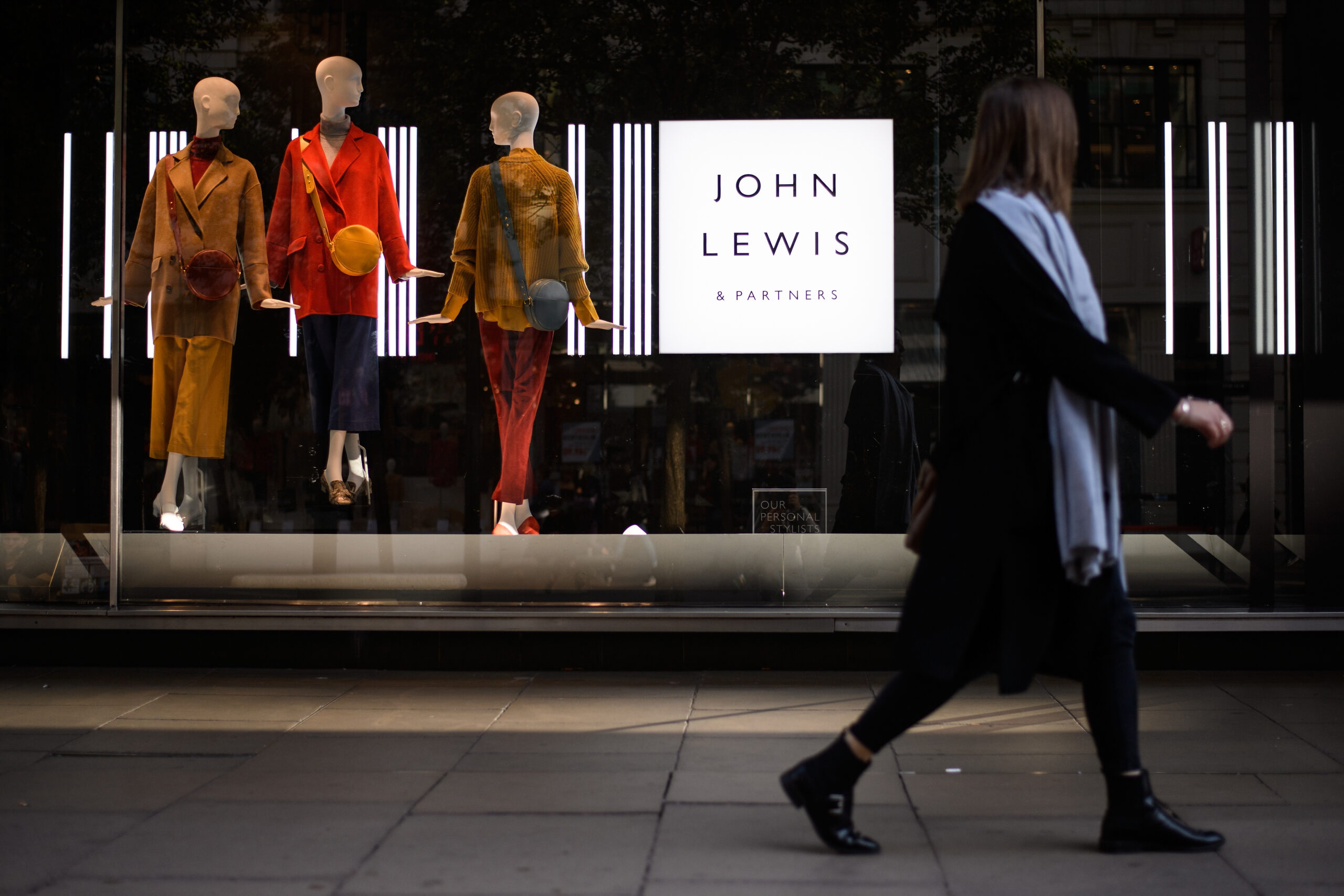 Person walking past John Lewis, which True VC help with innovation