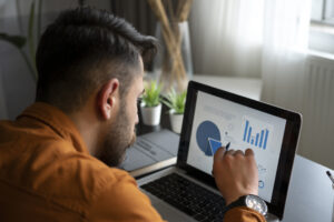Businessman looking at cash flow forecast