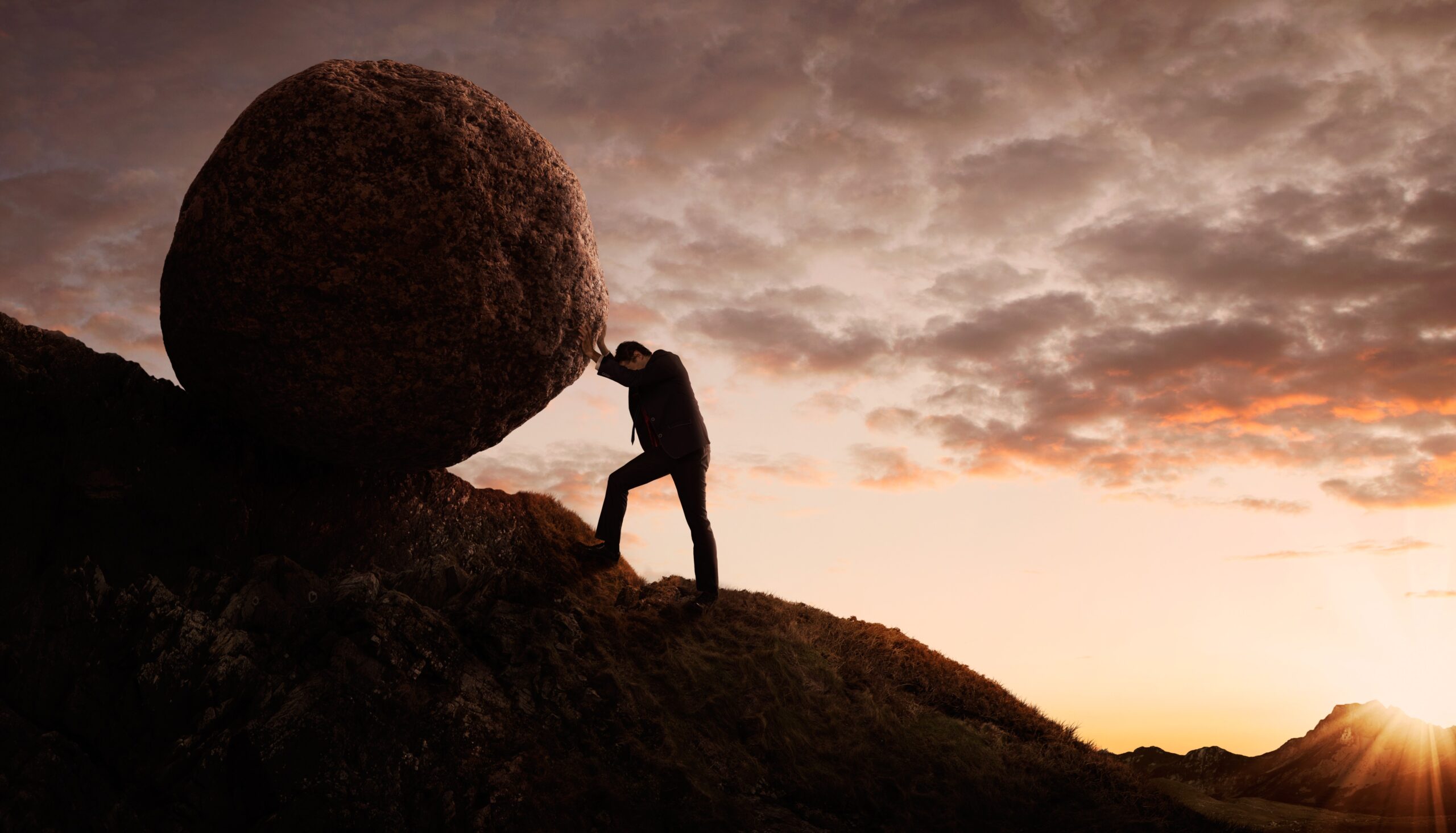 graphic of businessman pushing boulder uphill, grow a business concept