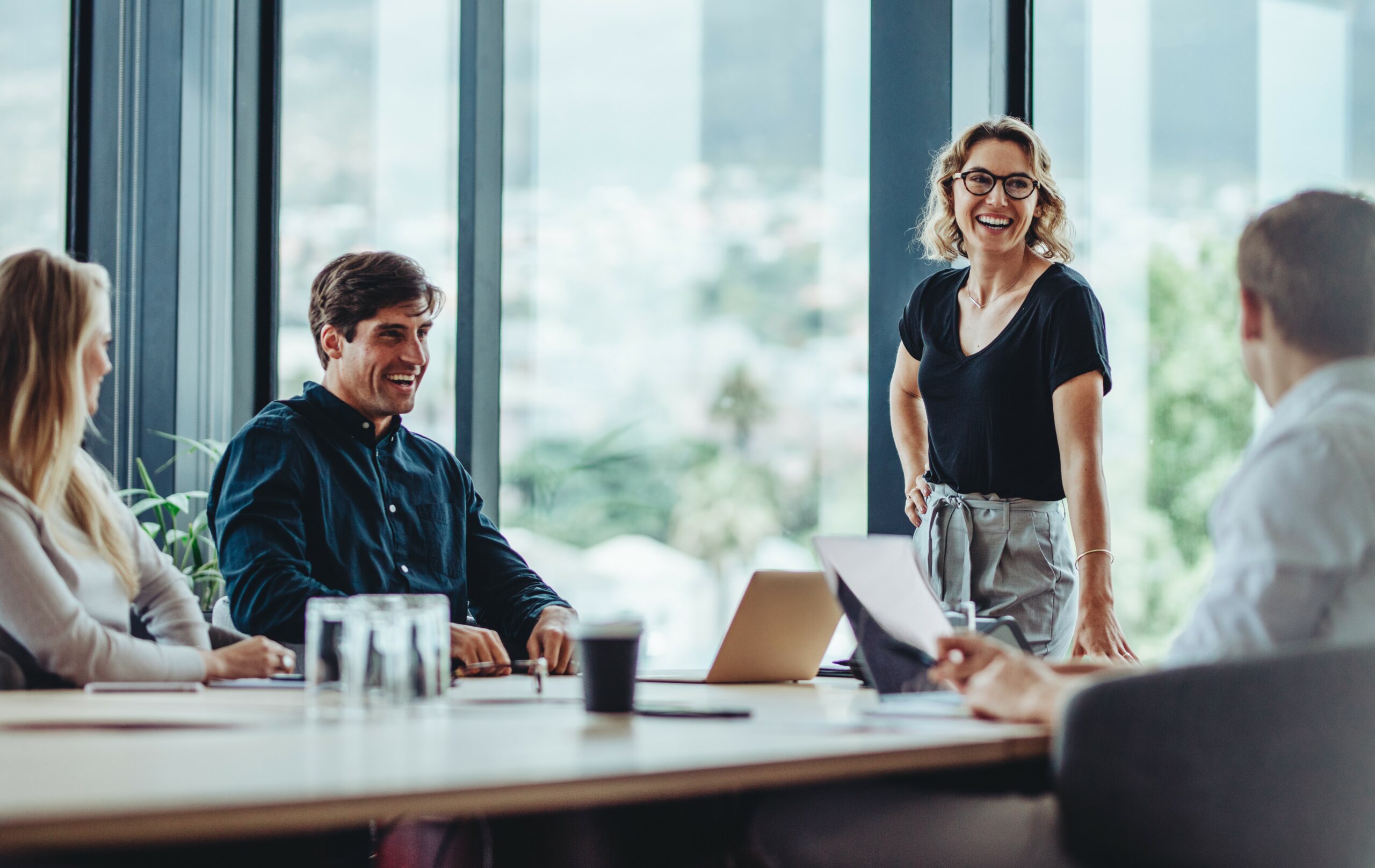 scaleups in common concept, happy board meeting in office