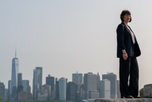 Future Growth Fund concept. Shadow chancellor Rachel Reeves standing on rocks with Manhattan skyline behind her while on official visit to America, 22 May 2023