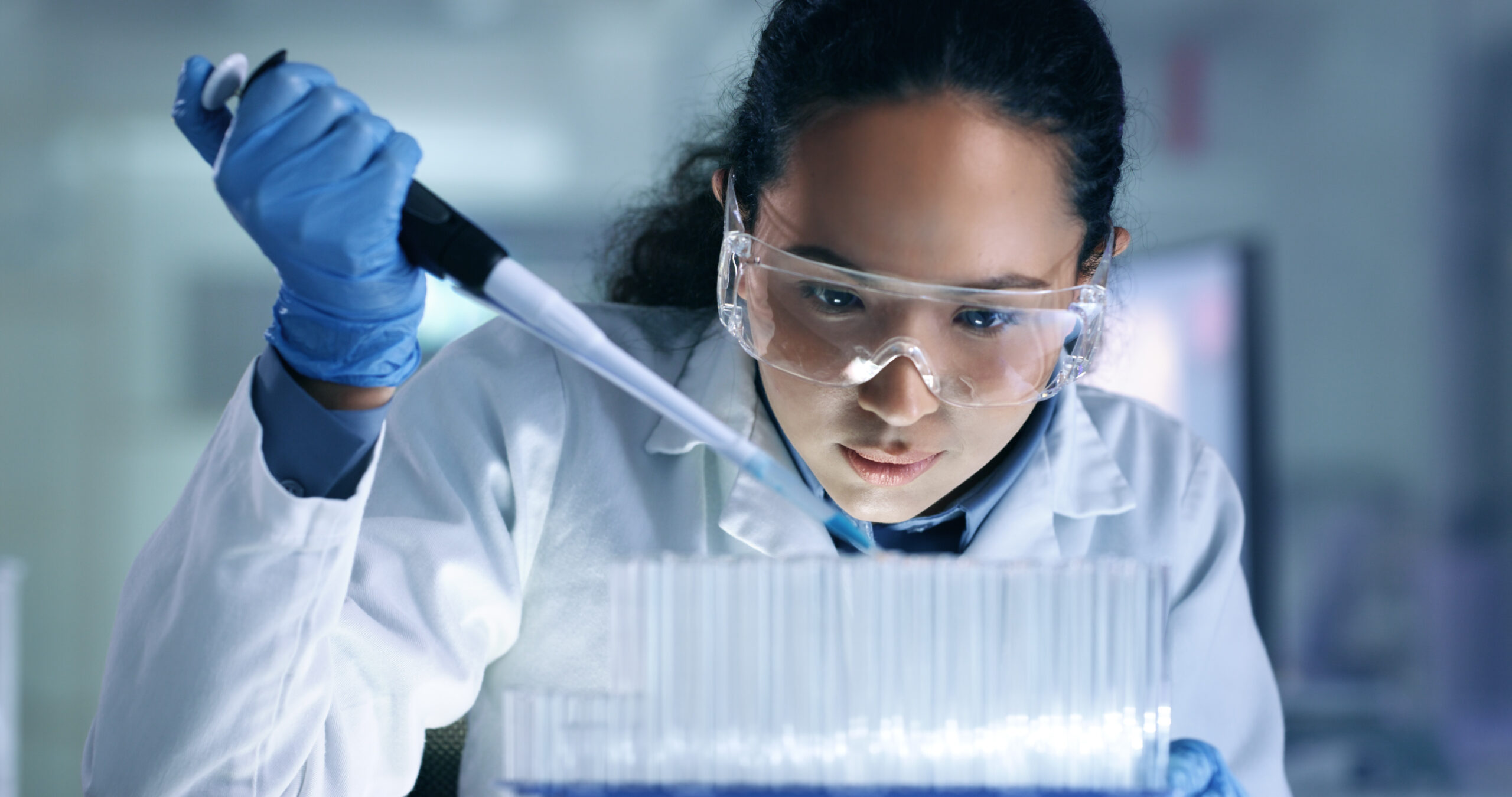 Lab researcher with test tubes
