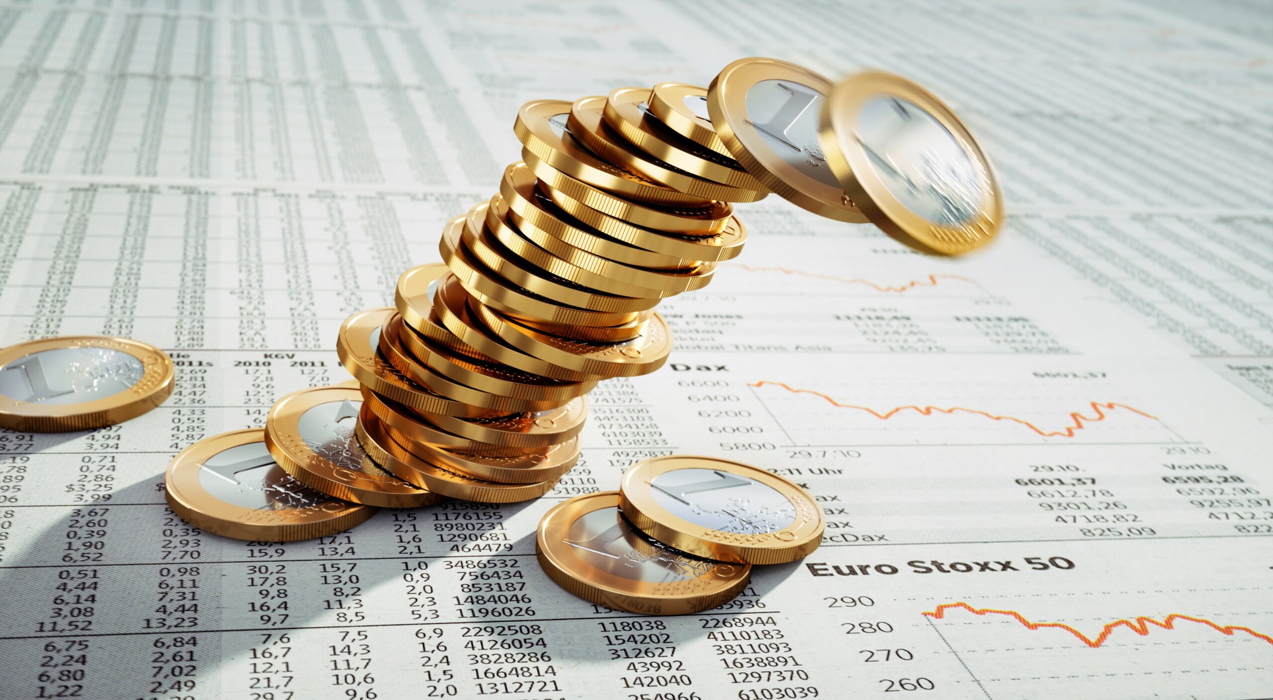 Venture capital funding concept. Tower of euro coins falling over onto financial newspaper
