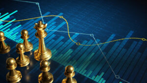 Corporate venture capital concept. Gold chess pieces face digital bar chart
