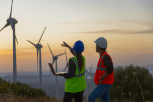 Workers at wind turbines farm